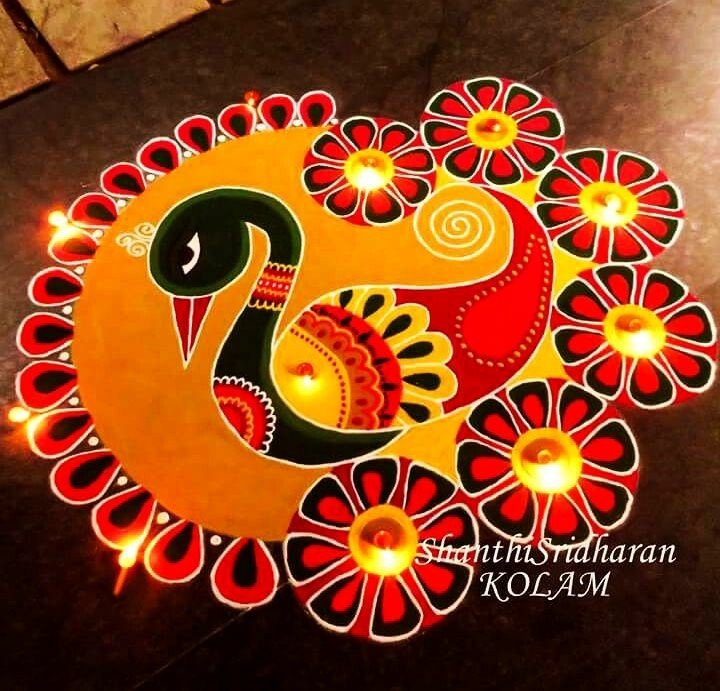 Beautiful Peacock Rangoli designs